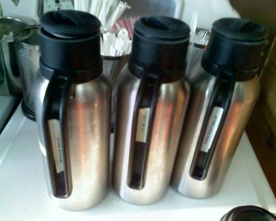 Milk Carafes with labels on the handle